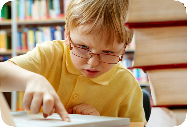 kid pointing at the book